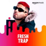 A man with red hair and sunglasses with the words fresh trap.