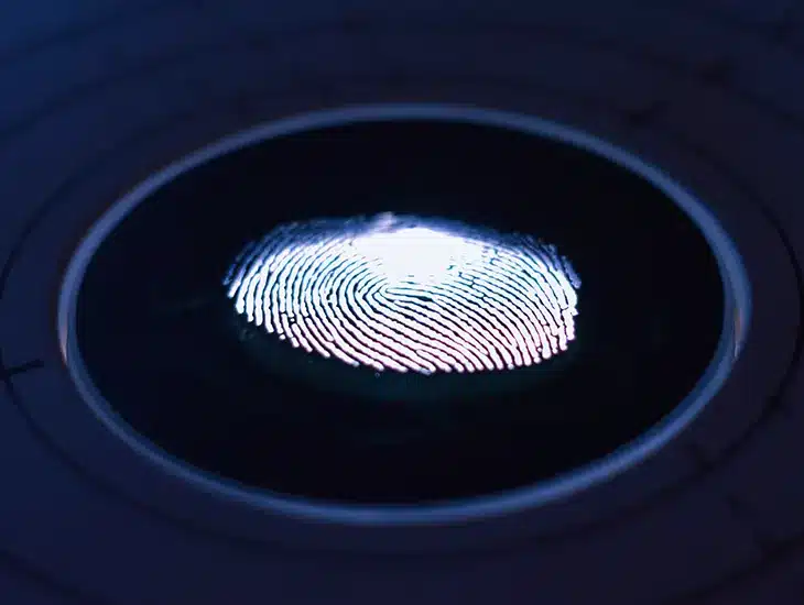 An image of a fingerprint enclosed within a circular shape with the Letter from Symphonic's CEO