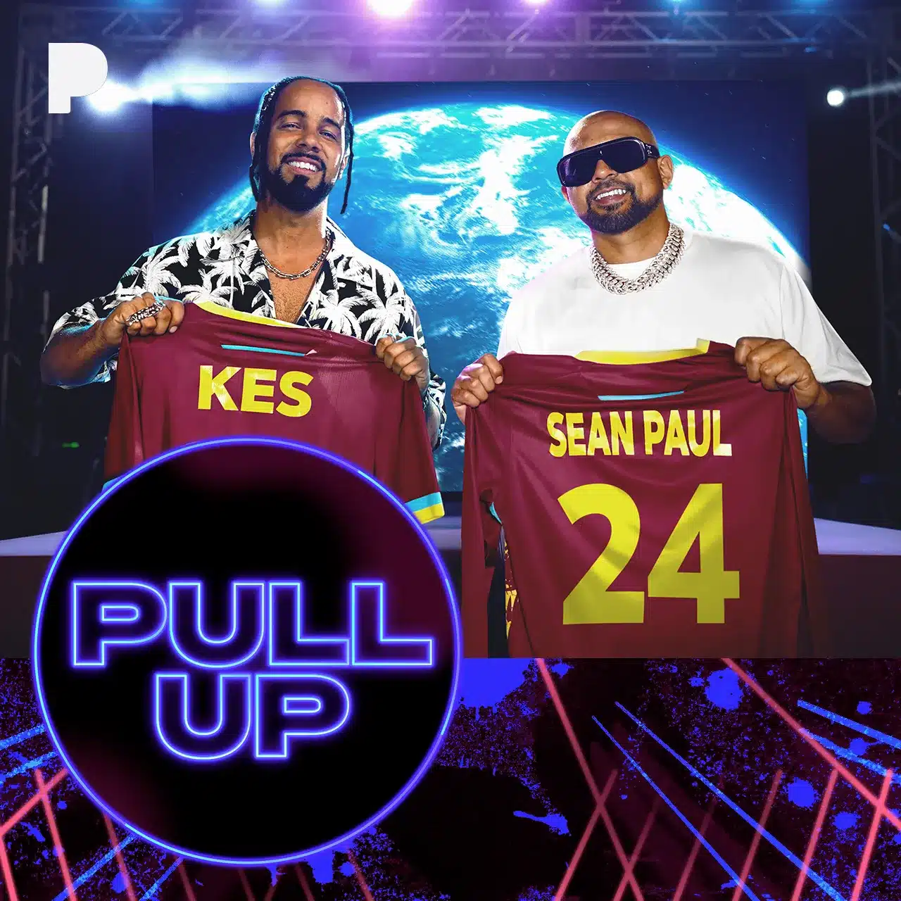 Two men holding jerseys with "Kes" and "Sean Paul 24" written on them, posing in front of a backdrop featuring an image of Earth. Text below them reads "PULL UP. This event could easily serve as a Grace Gaustad case study in merging music with global impact imagery.