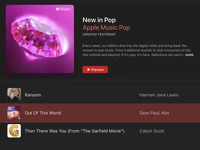 Screenshot of an Apple Music Pop playlist titled "New in Pop" with songs "Ransom" by Hannah Jane Lewis, "Out of This World" by Sean Paul and Kes, and "Then There Was You" by Calum Scott displayed.