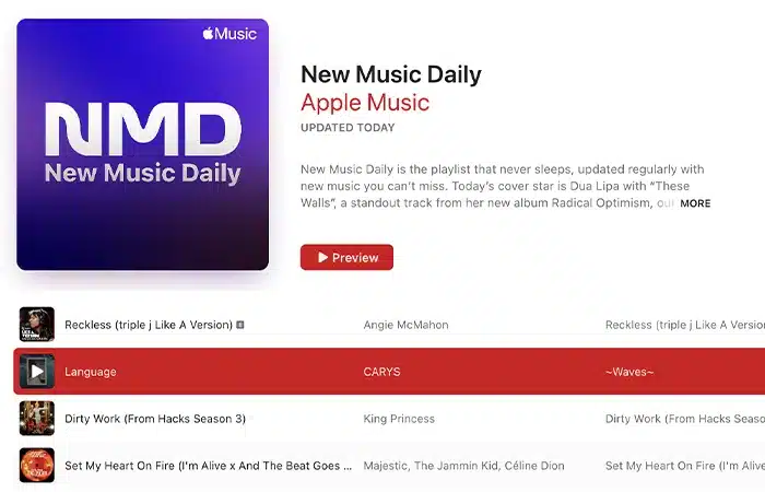 Screenshot of Apple Music's "New Music Daily" playlist, featuring tracks by Angie McMahon, King Princess, Majestic, and more. The cover star is Dua Lipa with the song "These Walls.